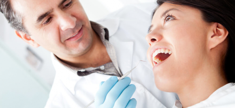 4 Signs You May Need a Root Canal, Plus: FAQ