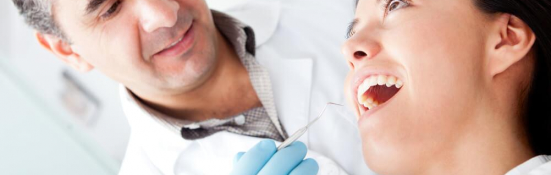 4 Signs You May Need a Root Canal, Plus: FAQ